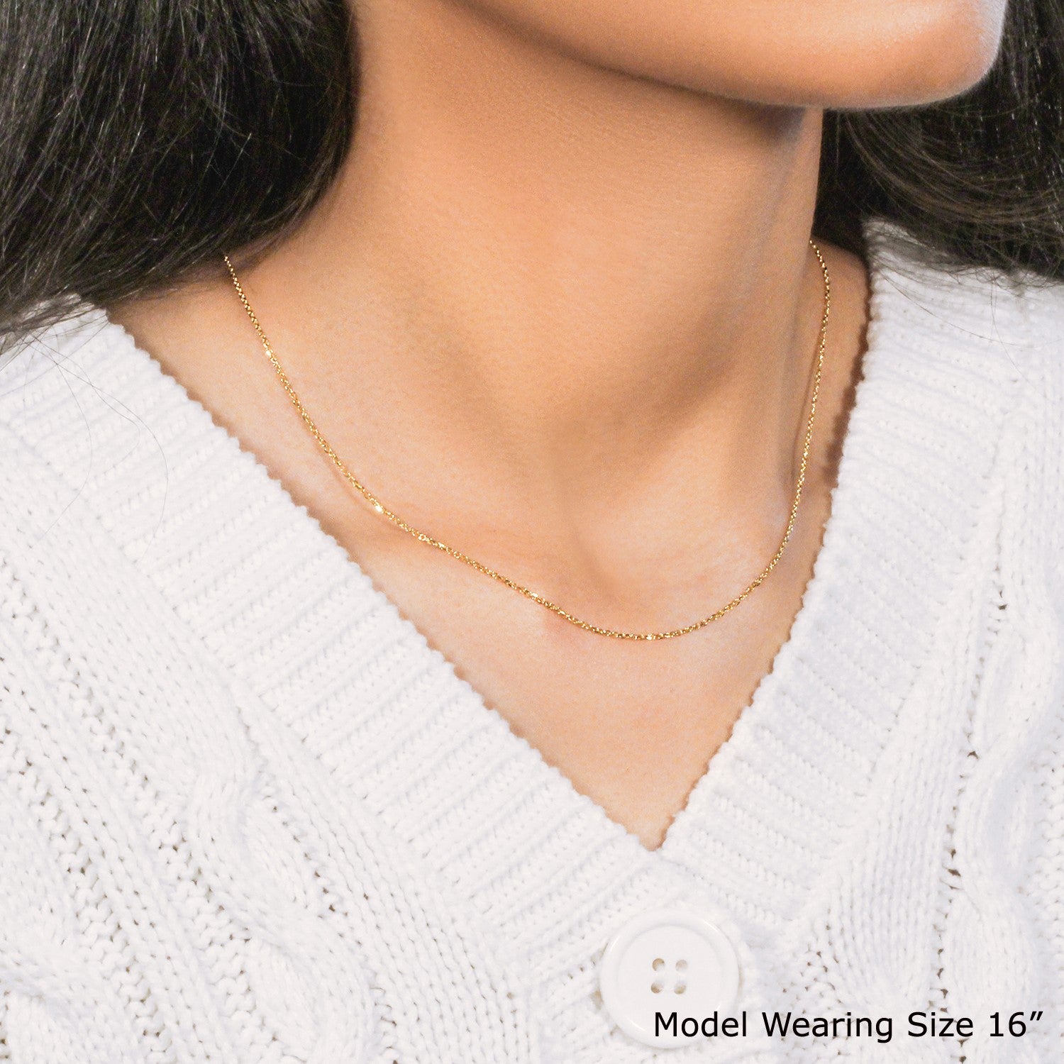 10k Yellow Gold Diamond Cut Cable Link Chain (1.10 mm) in a sleek high-contrast midnight luxury editorial style